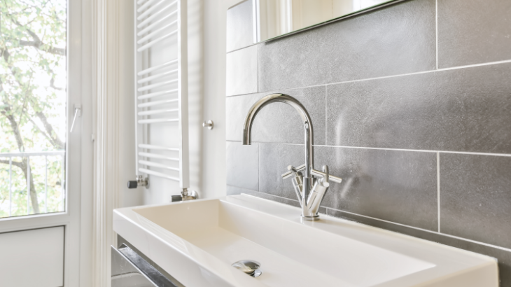 bathroom with modern sink and faucet